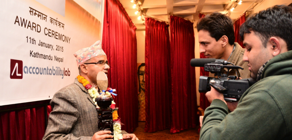 winner-with-media-after-ceremony-cropped